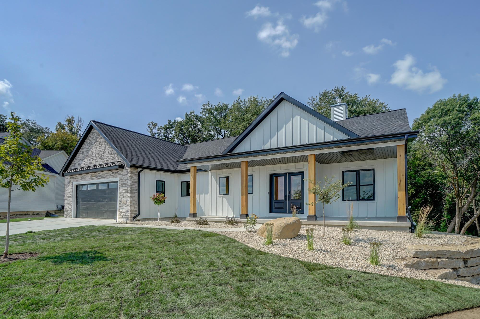 A modern farmhouse designed and built by Alterra Design Homes.