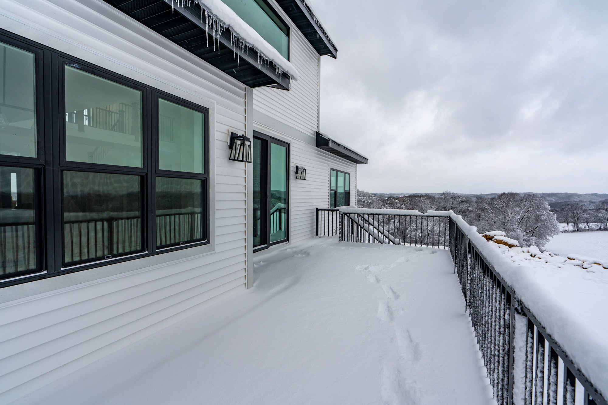 House exterior snow-covered deck
