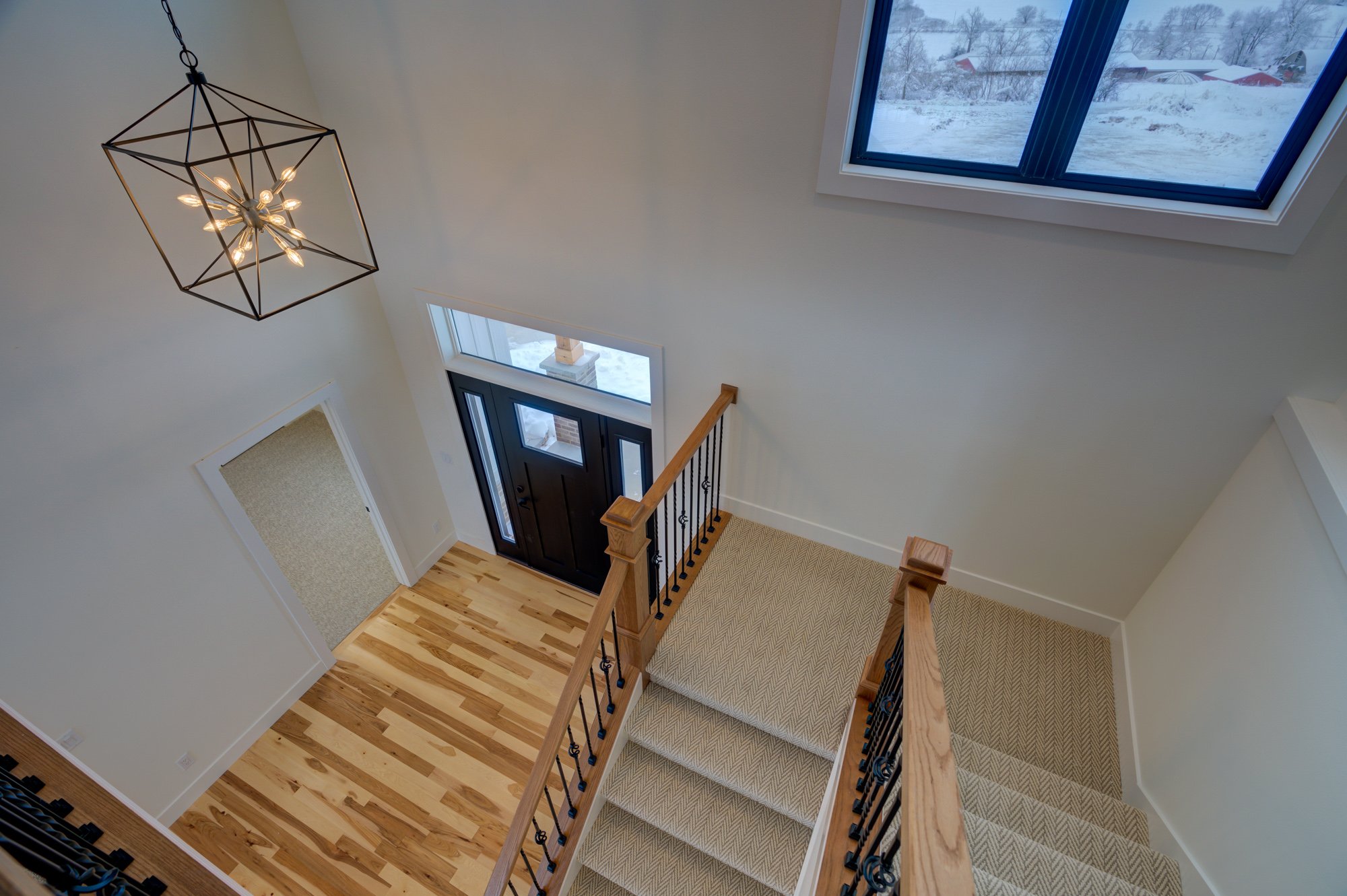 Looking down stairs to entryway