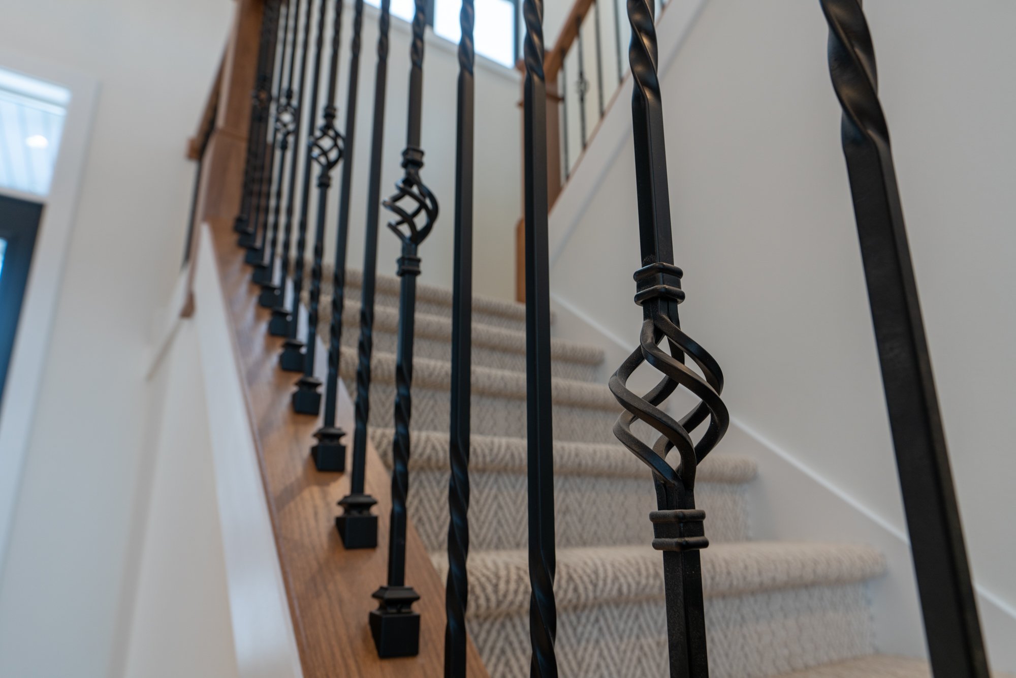 Metal spindles on staircase railing